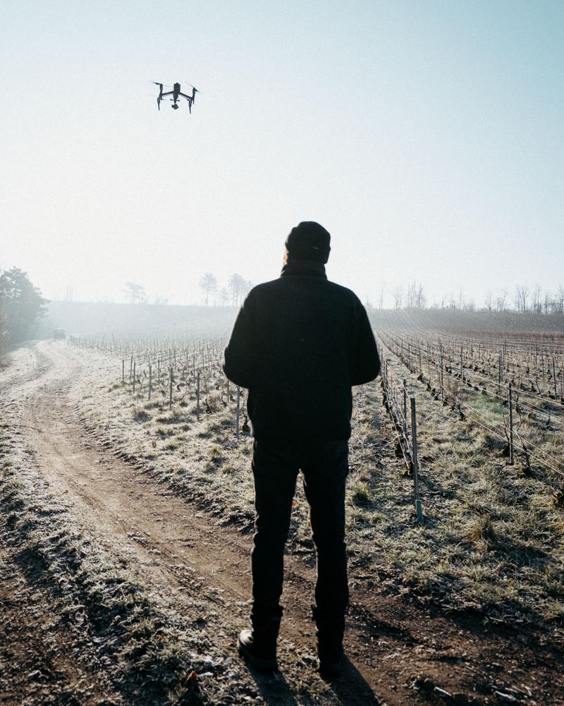 Behind the scenes TY Studio with Tilt & Pan flying drone over winter vines