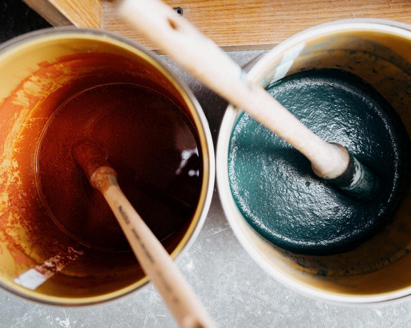 Close up of two paint pots at Duval et Mauler