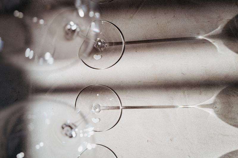 Empty wine glasses in the Orangerie tasting room at Calon Ségur