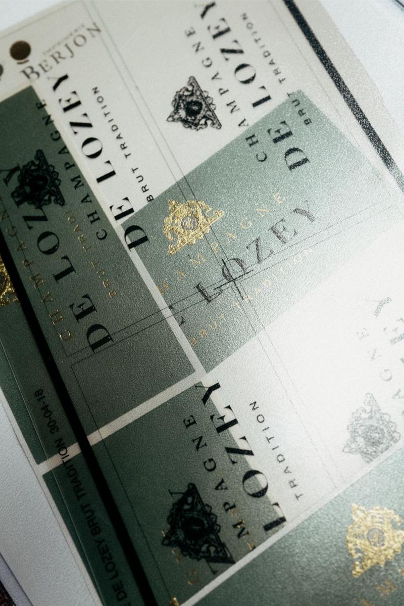Close up of Champagne De Lozey label stencil guides