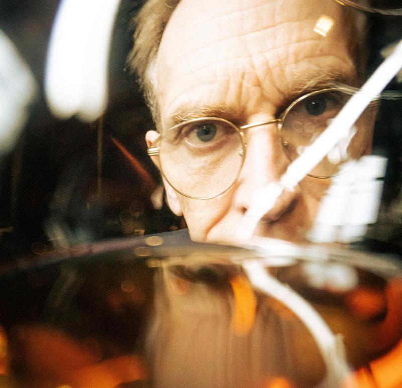 Close up of the eye of Delamain Cellar Master Charles Braastad inspecting the Cognac eaux-de-vie in a glass