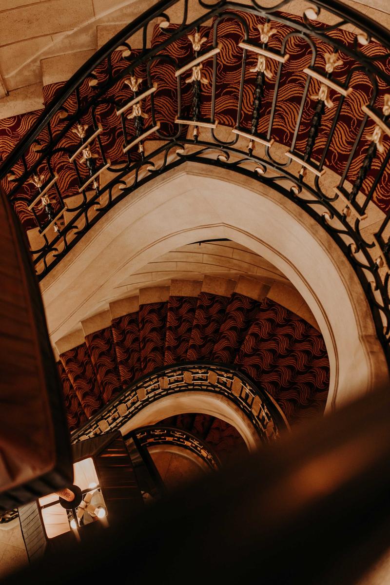 View down onto a spiral staircase in a luxury hotel