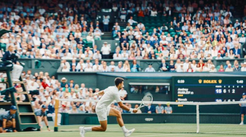 Still from Lanson x Wimbledon campaign, archive TV footage