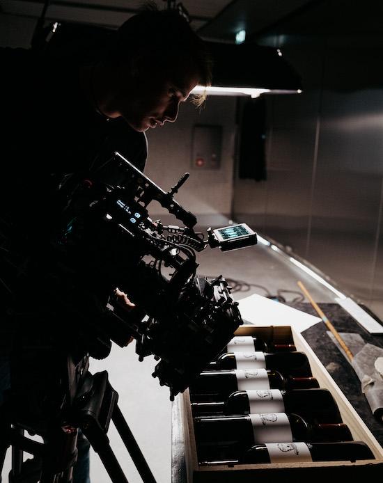 Théo Reynal filming packshot of Le Dôme bottles with Arri Alexa mini