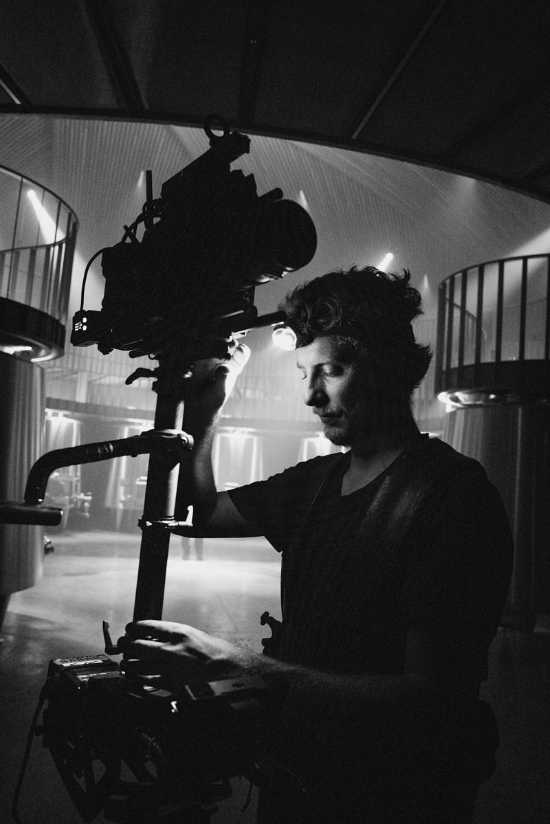 Backstage preparation of steadcam under torchlight