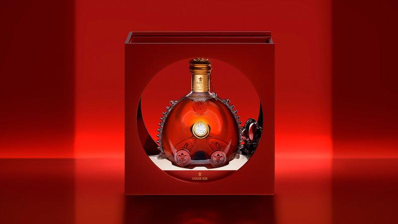 Beauty shot of LOUIS XIII Cognac new life coffret on red background