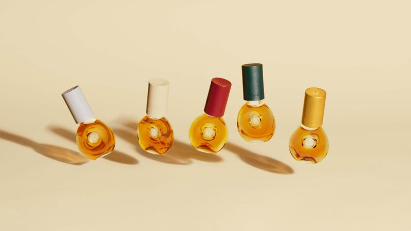 Product shot of range of different coloured LOUIS XIII THE DROP