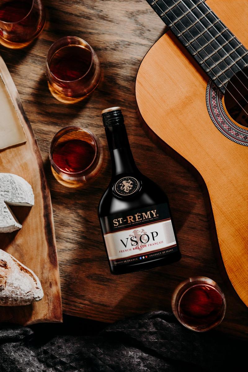 St-Rémy VSOP product key visual guitar and cheese scene